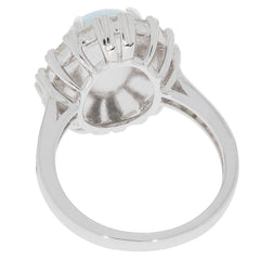 Back view of an Oval White Opal Sterling Silver Ring showcasing the detailed metalwork and gemstone setting.