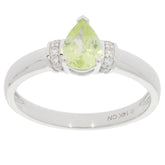 Green Peridot pear-shaped 14K white gold ring with diamond accents, elegant jewelry piece for sophisticated collections.