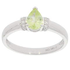 Green Peridot pear-shaped 14K white gold ring with diamond accents, elegant jewelry piece for sophisticated collections.