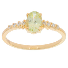 14K yellow gold ring featuring a green peridot center stone and diamond accents, elegant jewelry for sophisticated style.