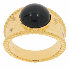 Elegant gold ring featuring a bold black gemstone centerpiece, accented with sparkling details, perfect for luxury jewelry collections.