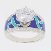 White Moissanite sterling silver ring with colorful enamel accents and a large sparkling gemstone.