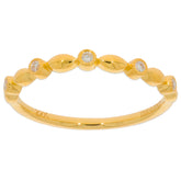 Elegant gold ring with diamond accents, showcasing a timeless design for sophisticated style.