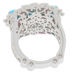 Sterling silver ring featuring an oval blue turquoise stone and intricate design, highlighting its elegance and craftsmanship.