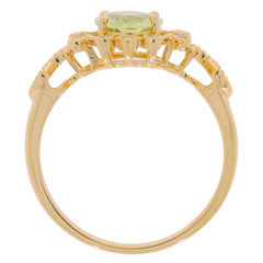 Oval green peridot 14K yellow gold ring with diamond accent, showcasing elegant design and luxury craftsmanship.
