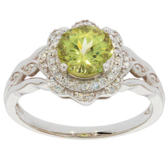Green Peridot and diamond accent 14K white gold ring, showcasing elegant design and timeless beauty.