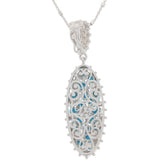 Elegant Blue Turquoise Sterling Silver Pendant with intricate design and Moissanite accent, perfect for sophisticated style.