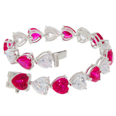 Heart pink sapphire sterling silver bracelet with moissanite accents, showcasing elegance and luxury.