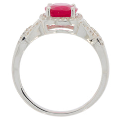 Oval red ruby sterling silver ring showcasing sparkling gemstone detail and elegant design.