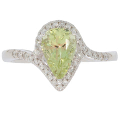 Green Peridot 14K White Gold Ring with Diamond Accent, elegant teardrop design, sparkling gemstone jewelry.