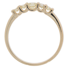 14K yellow gold ring featuring round green diamonds with elegant accents for a luxurious look.