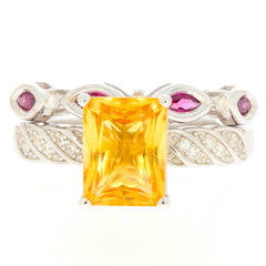 Yellow Citrine Sterling Silver Ring with accent gemstones, showcasing elegance and luxury in a stunning design.