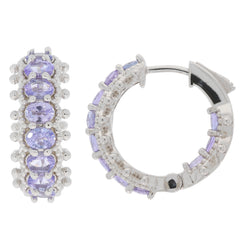 Elegant oval purple sapphire sterling silver earrings, featuring sparkling gemstones and a chic hoop design.