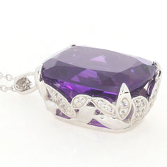 Purple amethyst sterling silver pendant with sparkling accents, showcasing elegance and luxury.