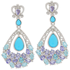 Elegant Pear Blue Turquoise sterling silver earrings with Topaz accents and intricate design.