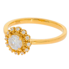 Elegant 22K gold ring featuring a round white diamond in a stunning floral design with additional diamond accents.