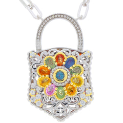Multiple color sapphire and garnet sterling silver pendant with floral design and intricate detailing.