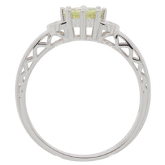 Elegant Green Peridot 14K White Gold Ring with diamond accents, showcasing intricate design and timeless beauty.