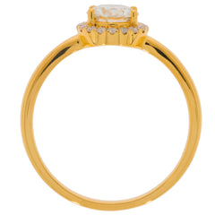 14K yellow gold ring featuring a round white diamond center stone and diamond accents, showcasing exquisite elegance.