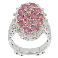 Pink sapphire sterling silver ring with intricate design and multiple sparkling gemstones, perfect for elegance.