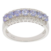 Blue Tanzanite sterling silver ring adorned with sparkling gemstones, showcasing elegance and luxury.