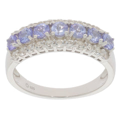 Blue Tanzanite sterling silver ring adorned with sparkling gemstones, showcasing elegance and luxury.
