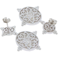 Oval white sterling silver earrings with intricate filigree design, featuring a stylish and elegant look.