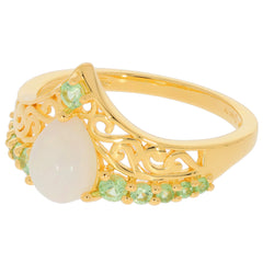 Elegant pear white opal sterling silver ring with green accent gemstones in intricate design.
