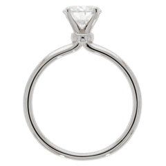 Round white Moissanite sterling silver ring featuring a sparkling gemstone on a sleek band, perfect for elegance.