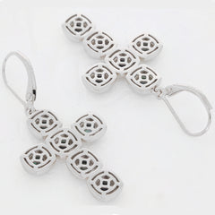 Sterling silver cross earrings with intricate cutout design, perfect for elegant occasions.