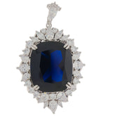Cushion blue sapphire sterling silver pendant with sparkling accent stones, perfect for elegant jewelry collections.