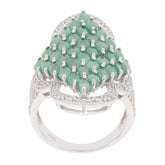 Marquise green emerald sterling silver ring with intricate design and sparkling gemstones.
