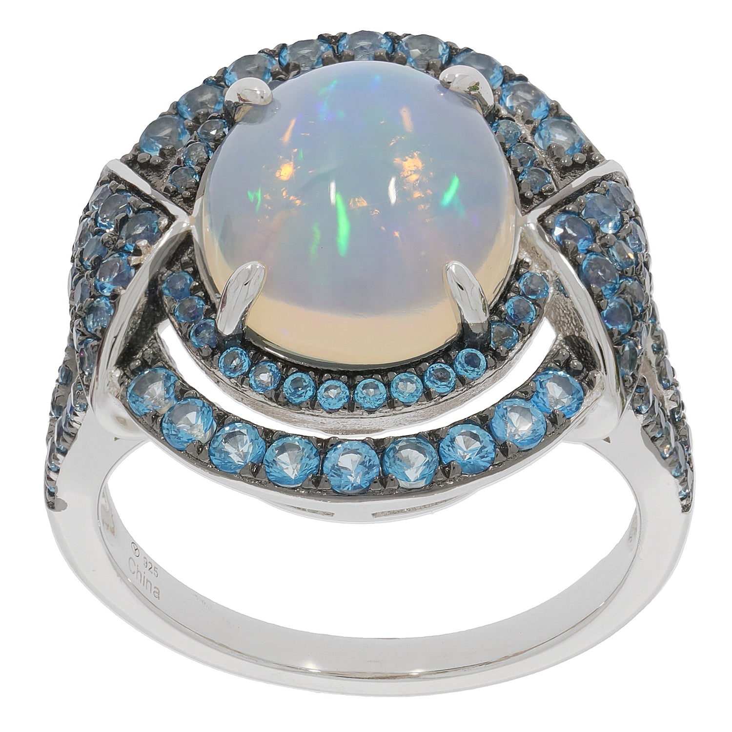 Oval white opal sterling silver ring with blue gemstone accents, radiating elegance and luxury.