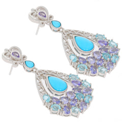 Elegant Blue Turquoise and Topaz Sterling Silver Earrings featuring a floral design, perfect for any occasion.