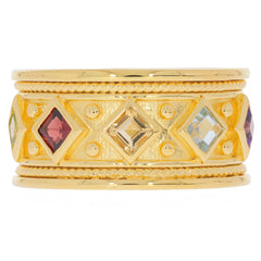 Gold ring with colorful gemstone accents in diamond shapes, perfect for elegant jewelry collections.