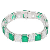 Green Emerald Sterling Silver Bracelet with Moissanite accents, showcasing elegant design and luxurious gemstones.