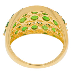Close-up view of the interior of a gold ring decorated with round green chrome diopside gemstones.