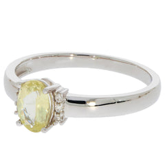 Green Peridot 14K white gold ring with diamond accent, showcasing elegance and luxury.