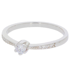 Round white diamond sterling silver ring with accent stones, showcasing timeless elegance and brilliance.