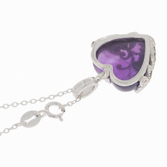 Heart-shaped purple amethyst pendant in sterling silver, showcasing elegance and luxury with sparkling accents.