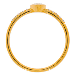 Elegant yellow gold ring with a pear-shaped white diamond centerpiece and accent stones, showcasing fine jewelry craftsmanship.