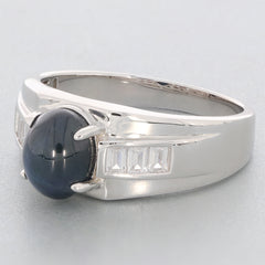 Oval black spinel sterling silver ring featuring sparkling accent stones, perfect for elegant style and luxury.