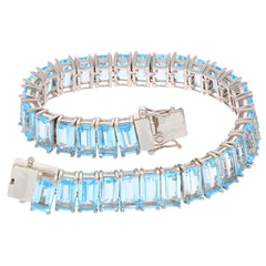 Emerald Blue Topaz Sterling Silver Bracelet, featuring sparkling blue gemstones, perfect for luxury and elegance.