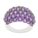 Round sterling silver ring featuring multiple sparkling purple amethyst gemstones in a stylish design.