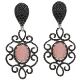 Oval pink Quartz earrings with Spinel accents in a decorative silver design, perfect for elegant style.