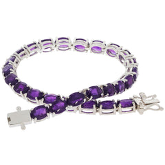 Purple amethyst sterling silver bracelet showcasing elegant gemstones, perfect for elevating your sophisticated style.