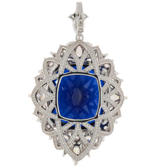 Cushion blue sapphire sterling silver pendant with intricate detailing and sparkling accents.