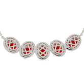 Elegant oval red garnet sterling silver necklace with intricate design, perfect for adding sophistication to any outfit.