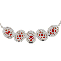 Elegant oval red garnet sterling silver necklace with intricate design, perfect for adding sophistication to any outfit.