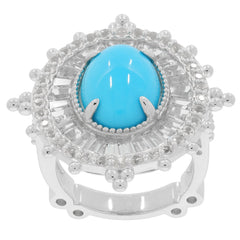 Oval blue turquoise sterling silver ring adorned with gemstones, showcasing luxury and elegance.